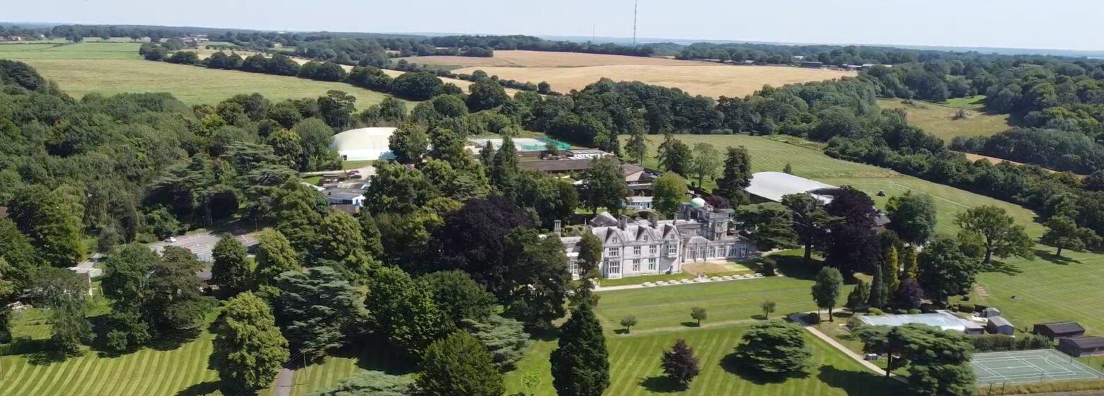 Aerial view of Abbot's Hill School and its parkland campus