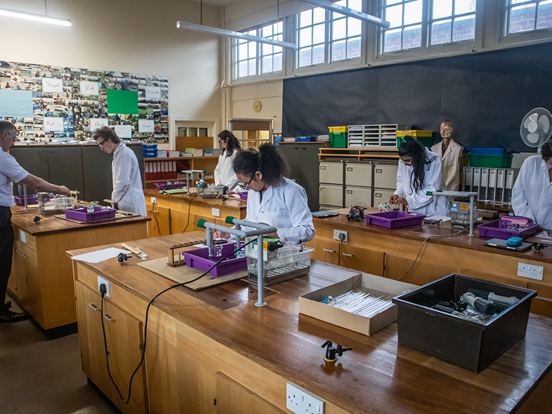 Ackworth School senior pupils carrying out practical work in a science laboratory