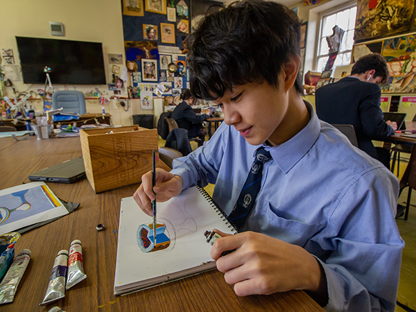 An Ackworth School senior pupil working in the art room