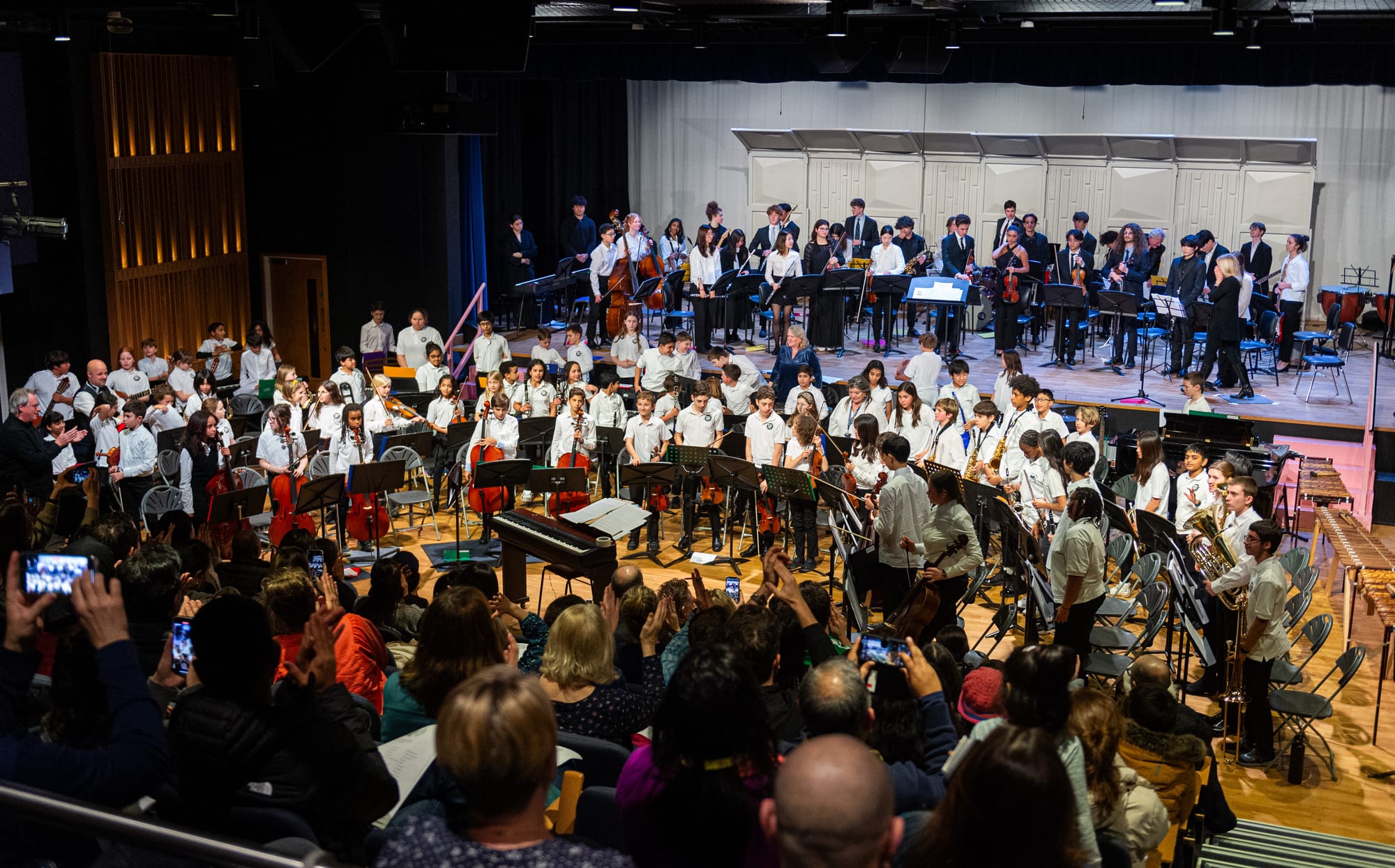 ACS Cobham pupils performing in the Poularas Performing Arts Centre