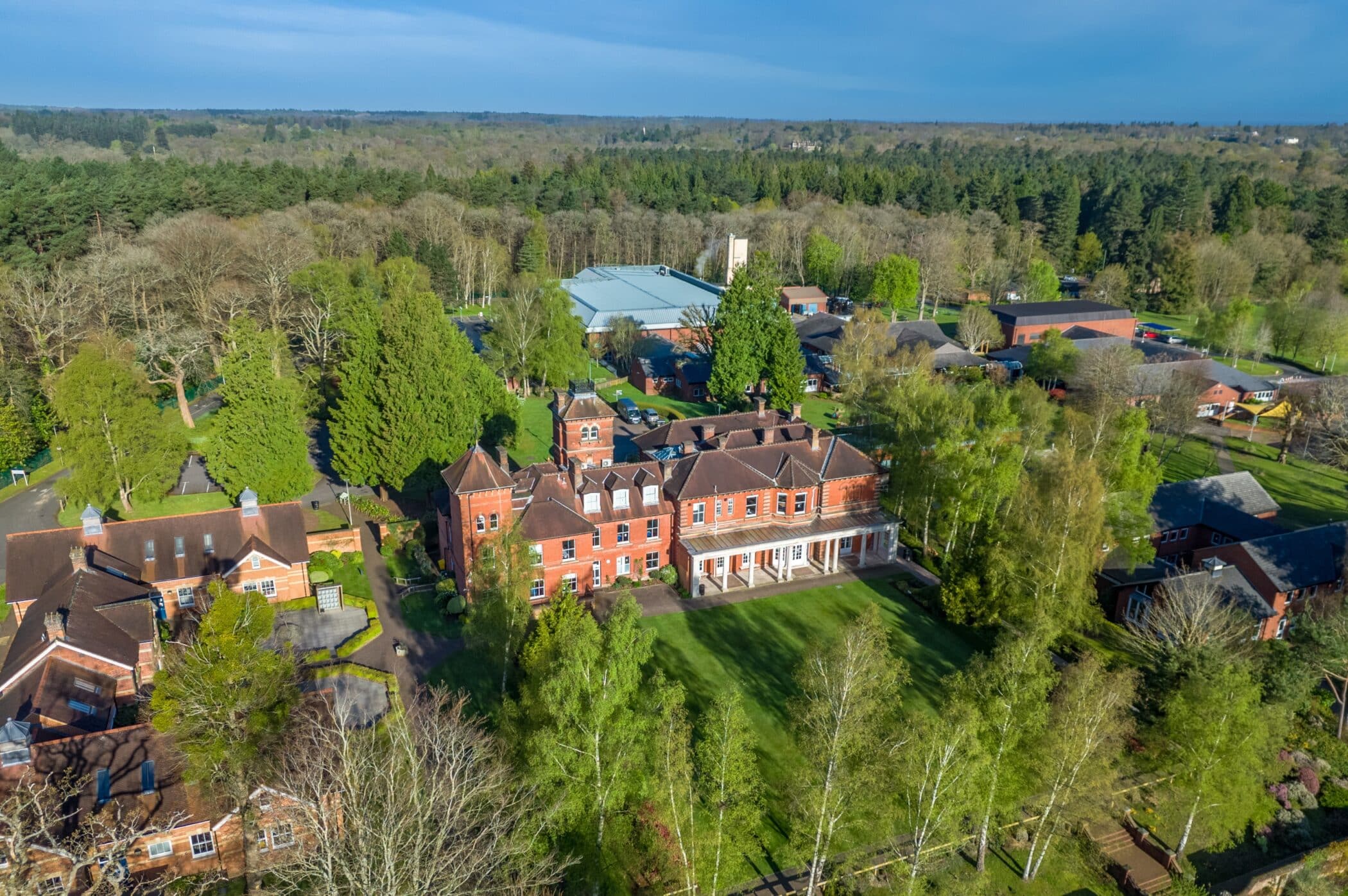 Aerial exterior view of the ACS Egham campus and Woodlee mansion