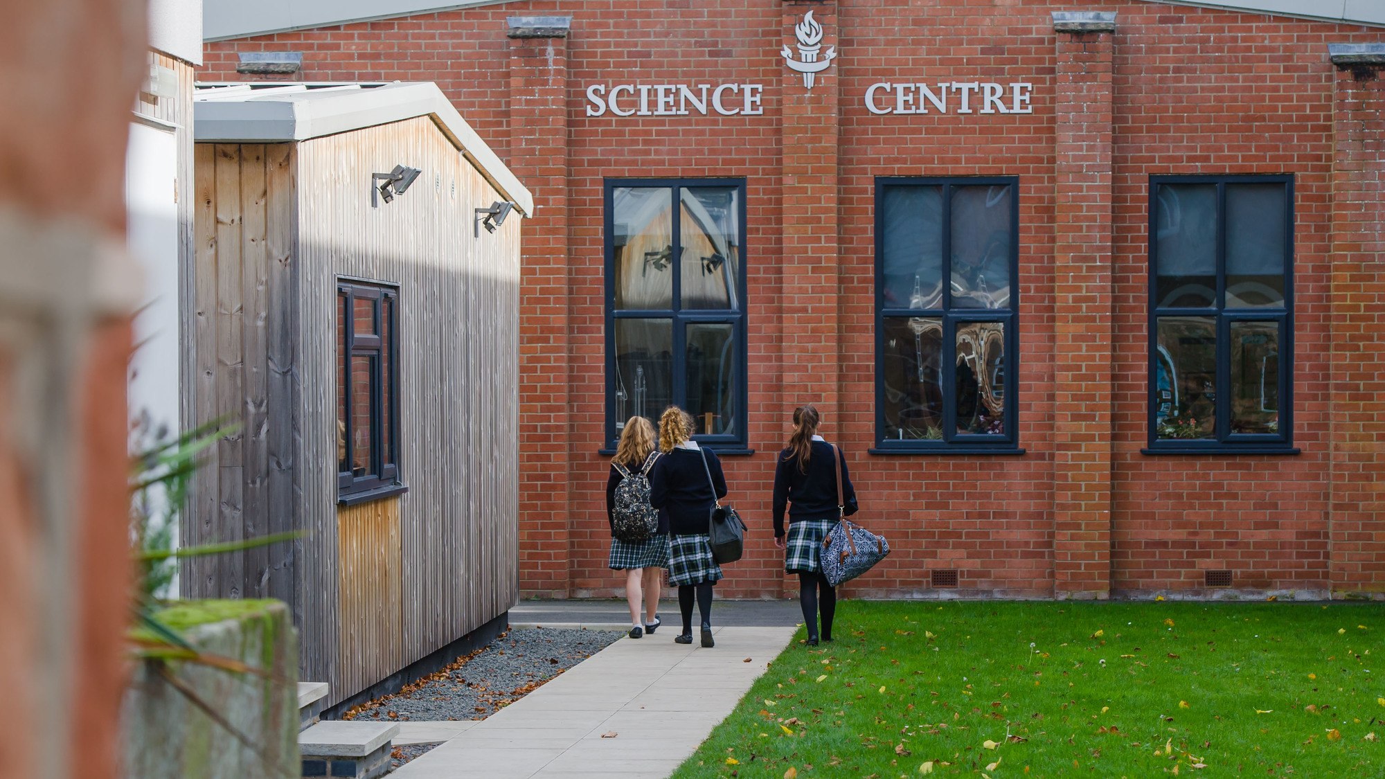 Adcote School pupils walking towards the Science Centre