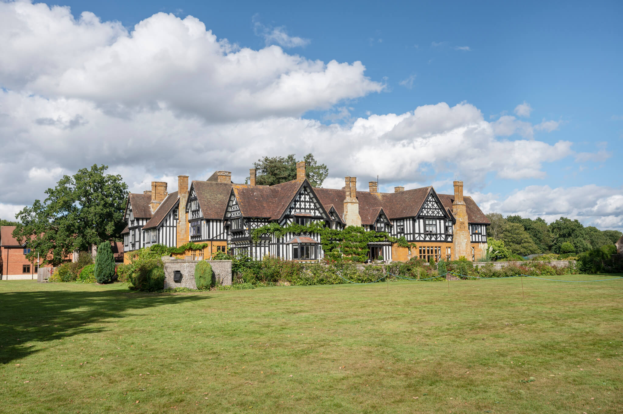 Akeley Wood House, the Senior School building, seen across its lawn