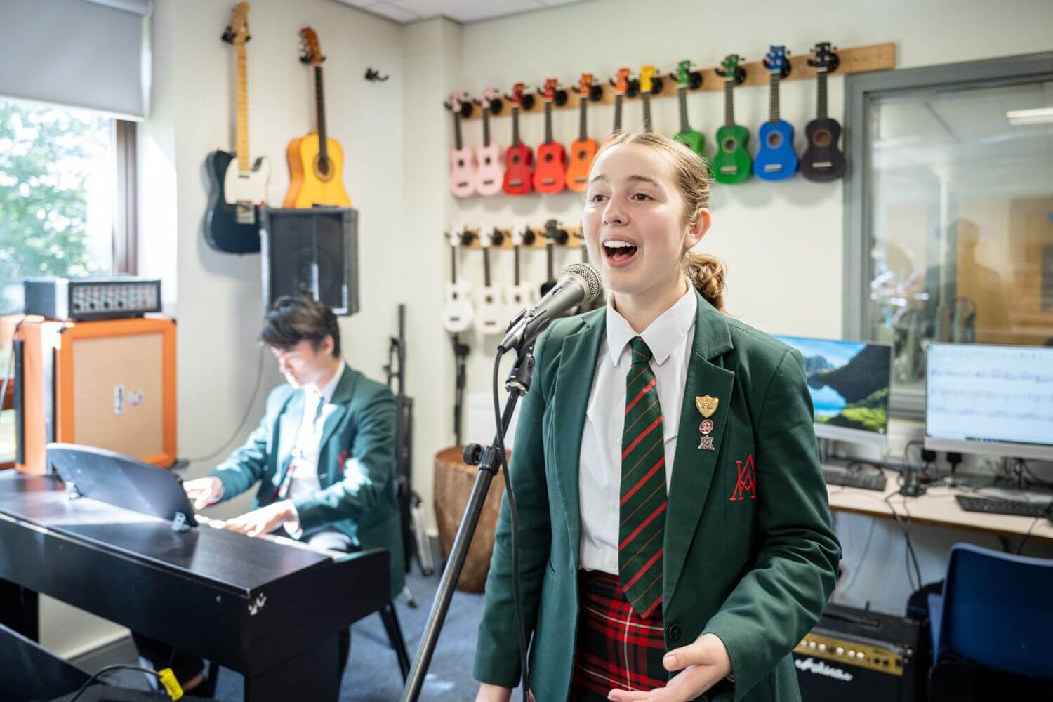 Akeley Wood Senior School pupils making music in the music technology suite