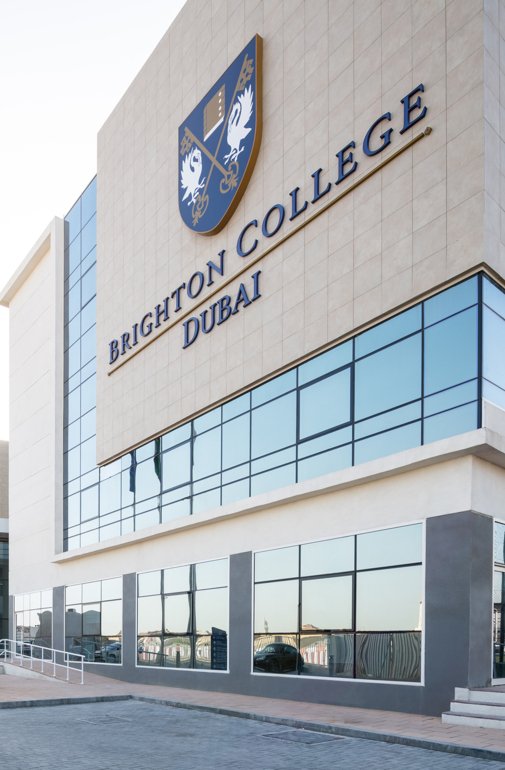 Main building with the Brighton College Dubai sign on the outside of the building