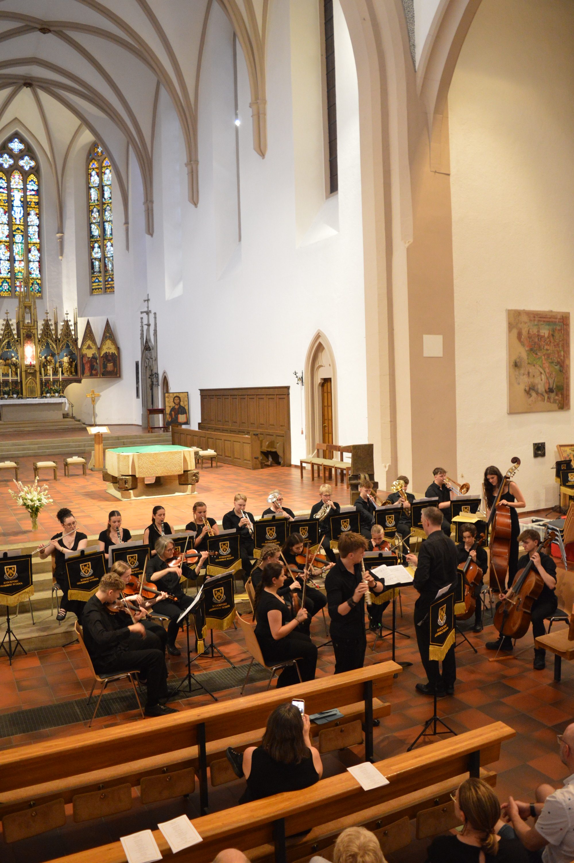 Musicians performing in a church during the 2026 music tour to the Black Forest, Germany