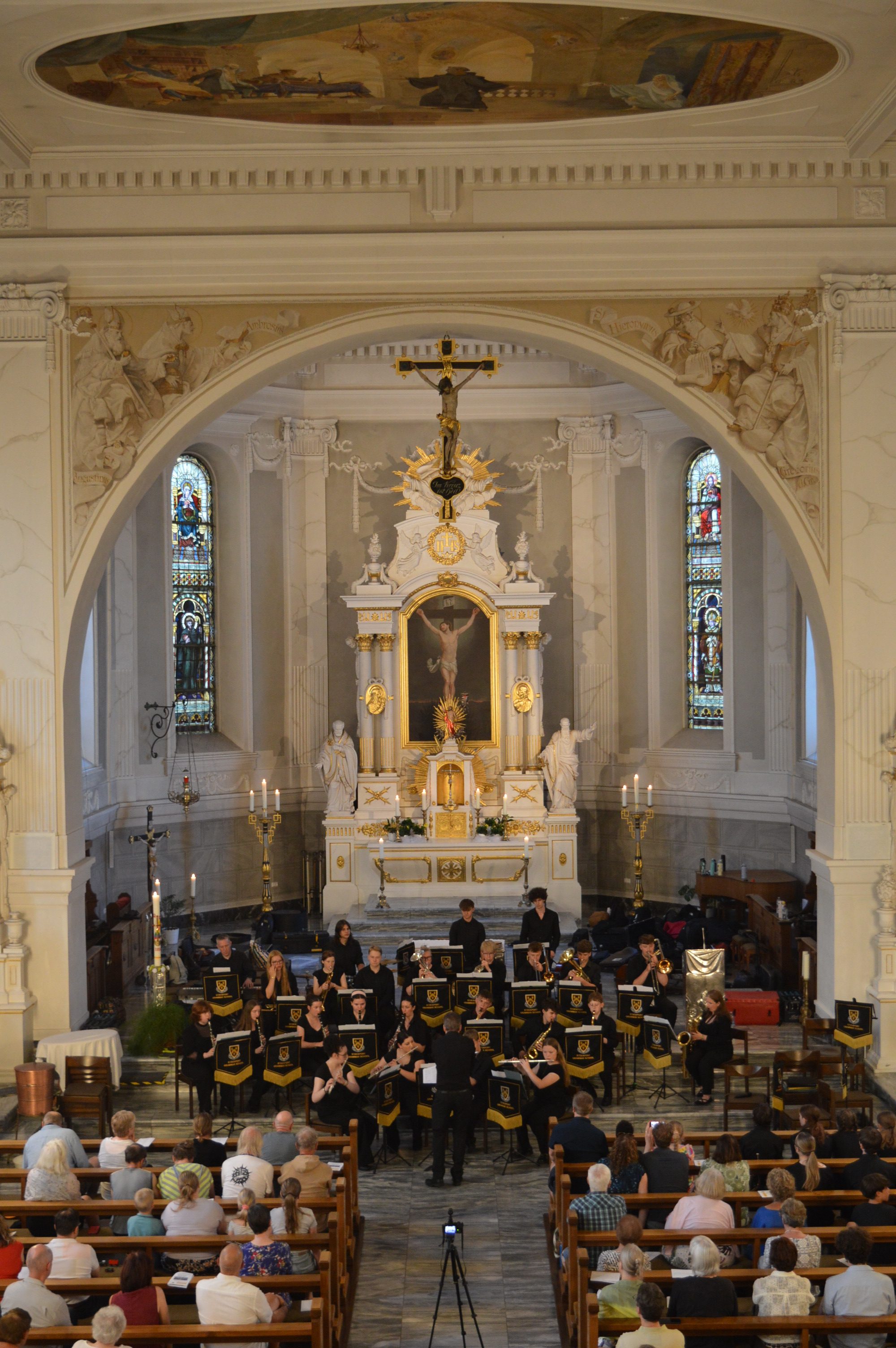 Musicians performing in a church during the 2026 music tour to the Black Forest, Germany